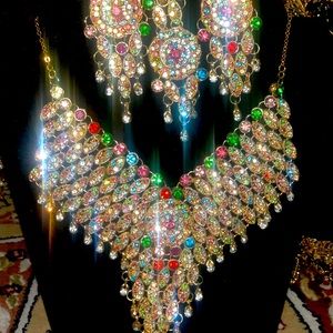 3 pieces Multicolored necklace, earrings, and headpiece set.